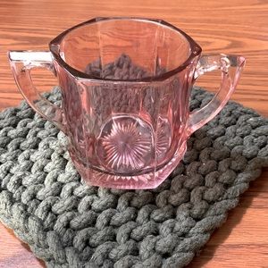 Pink depression glass spoon holder